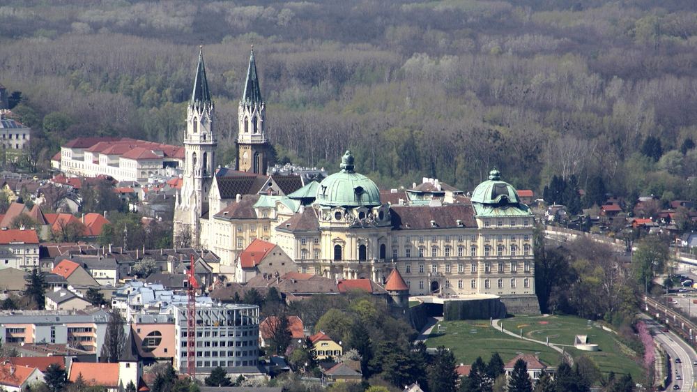 Klosterneuburg Abbey with its green domes above the town