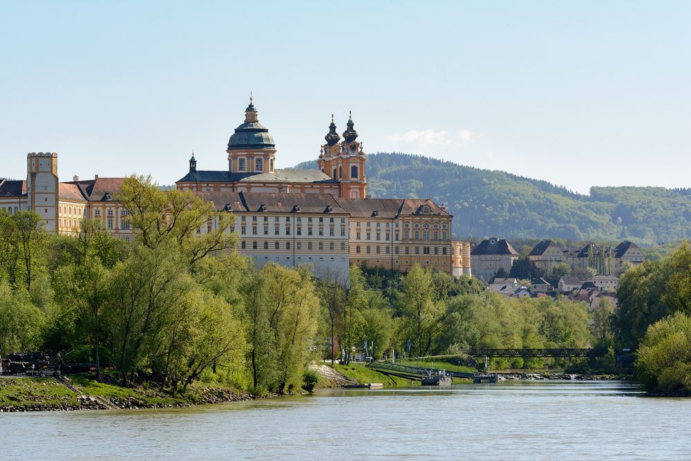 Yellow baroque Melk Abbey on a rock above the Danube